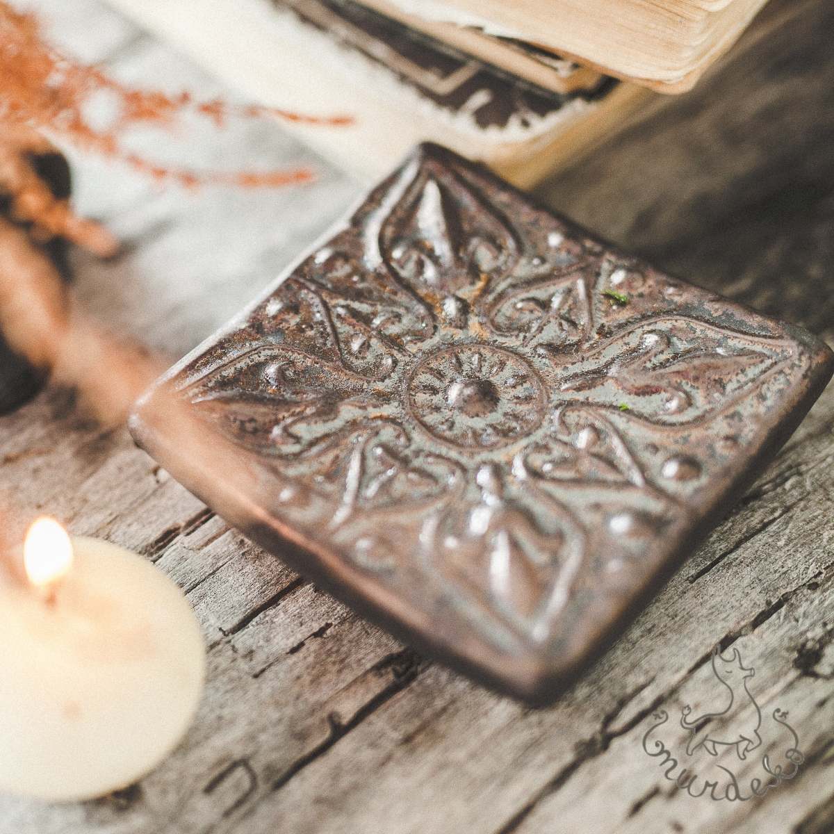 Handmade ceramic square soap dish. Crafted from white clay and finished with a matt brown glaze. Designed with drainage holes, a concave shape, and four little feet.