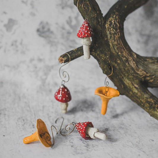 Christmas ornament set of six red amanita and orange chanterelle mushrooms. Packed in a gift box with hooks.