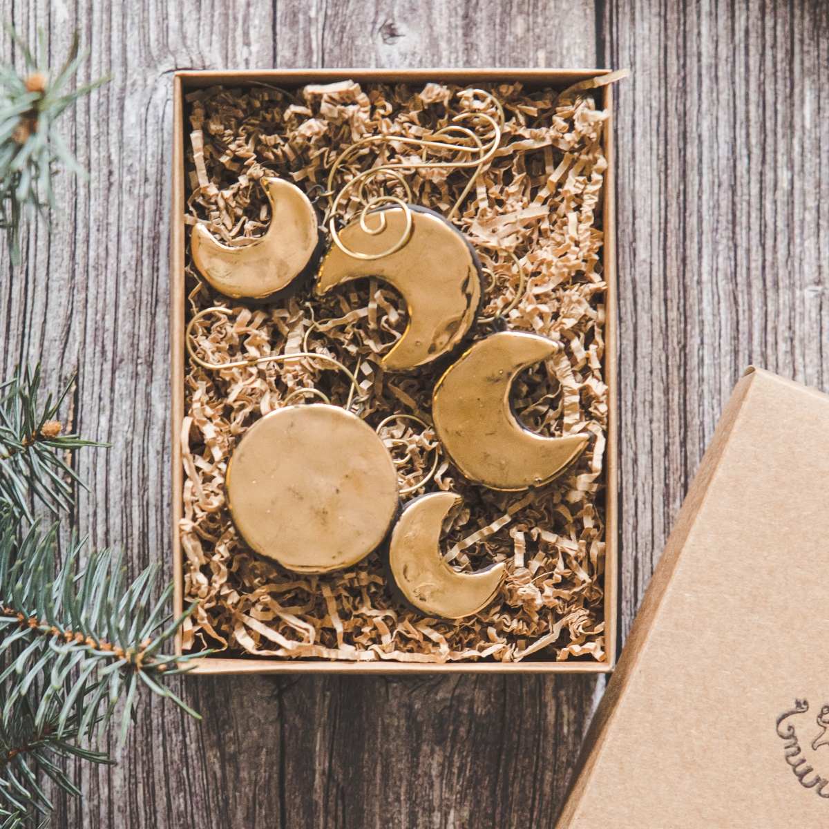 Gold plated ceramic moon phases Christmas ornament set of five: Full moon, young moon, old moon. Lunar Christmas decoration gift with hooks.