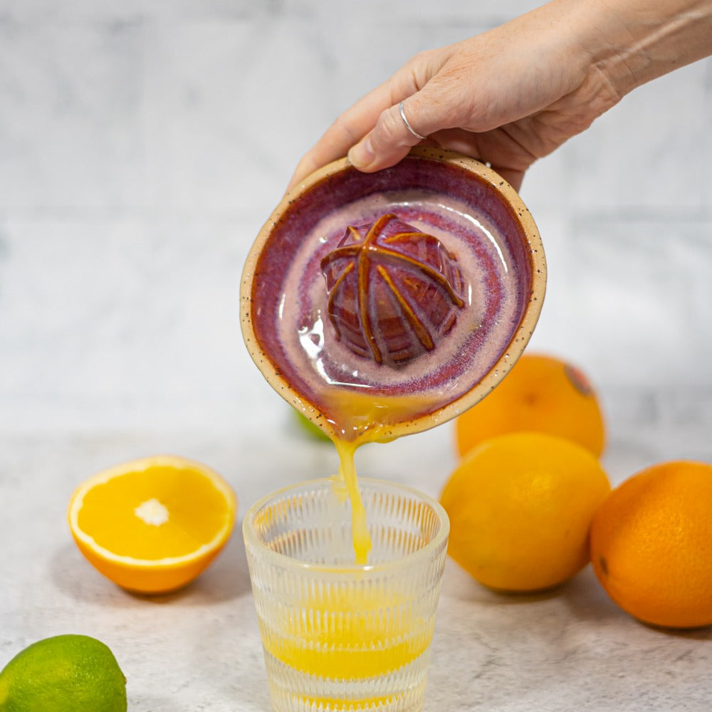 red ceramic lemon squeezer