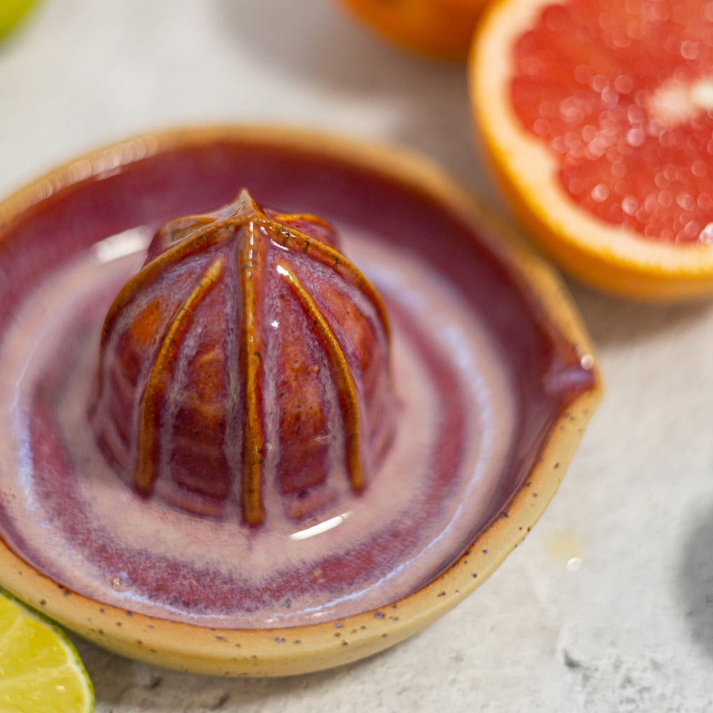 red ceramic lemon squeezer