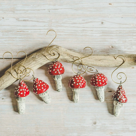 Christmas ornament set of six red amanita mushrooms. Packed in a gift box with hooks.