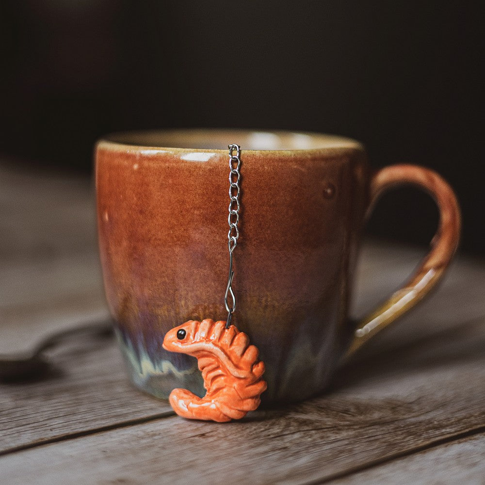 tea infuser with ceramic red shrimp hanging from the chain
