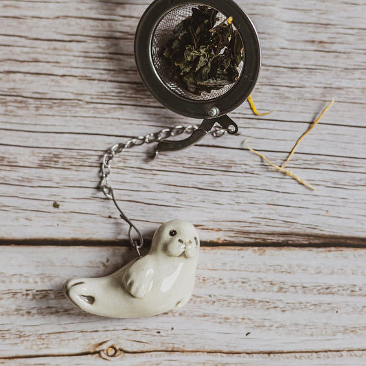 tea infuser with ceramic seal hanging from the chain