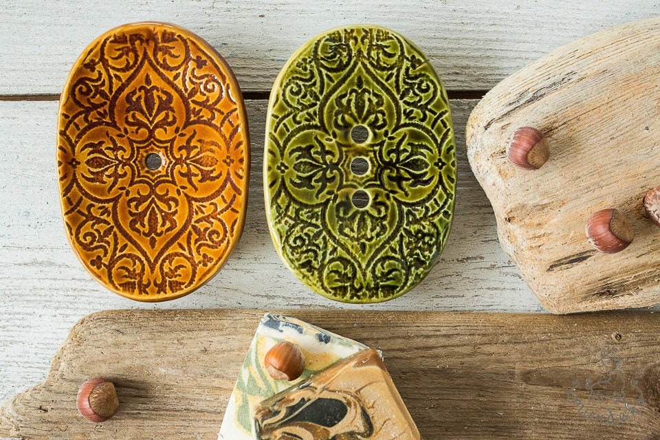 Green and brown soap dishes