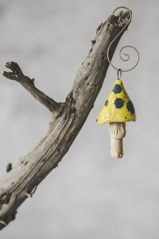 Yellow mushroom with blue spots