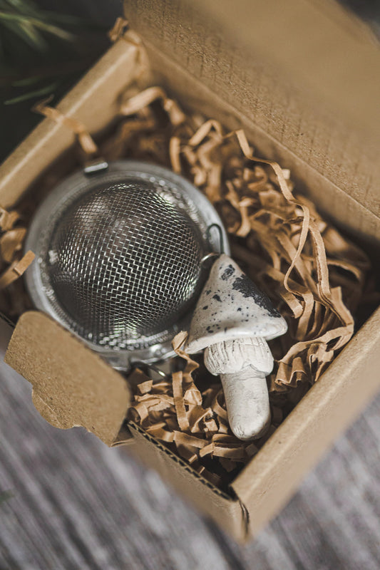 Tea infuser with white dotted mushroom