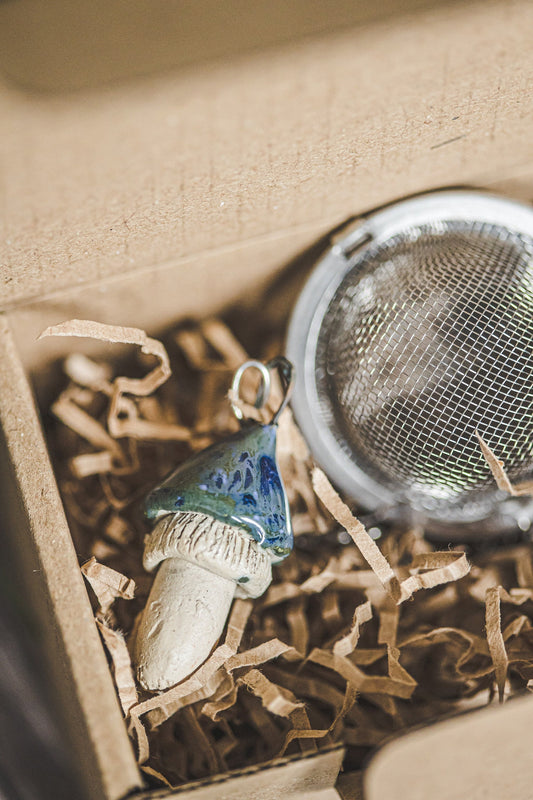 Tea infuser with swamp blue mushroom