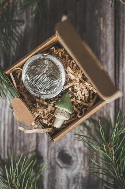 Tea infuser with green mushroom