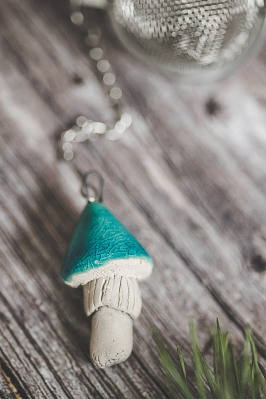 Tea infuser with turquoise blue mushroom