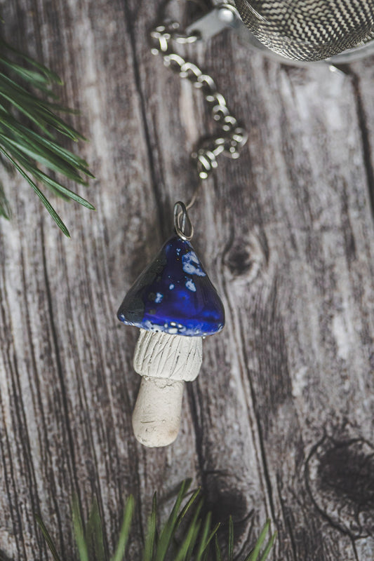 Tea infuser with blue mushroom