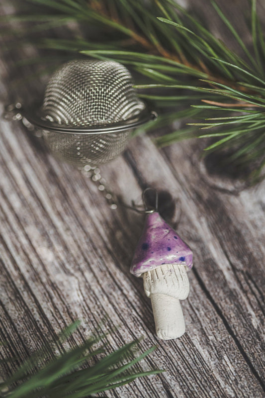Tea infuser with purple mushroom