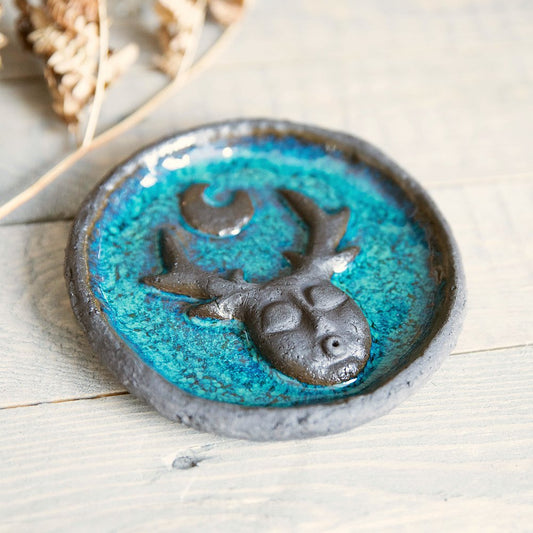 Handmade ceramic incense holder featuring mystic creature and the moon design. Crafted from black grogged clay and covered with blue glaze.