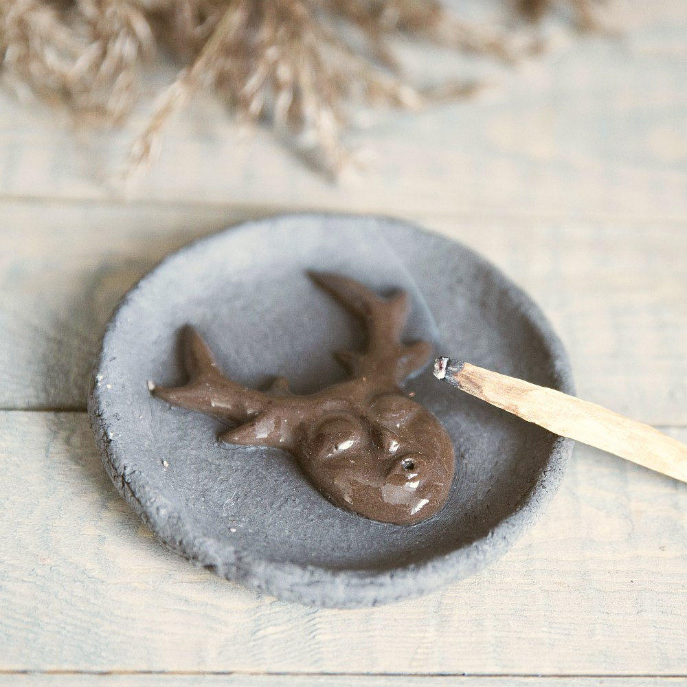 Handmade ceramic incense holder featuring mystic creature. Crafted from black grogged clay.