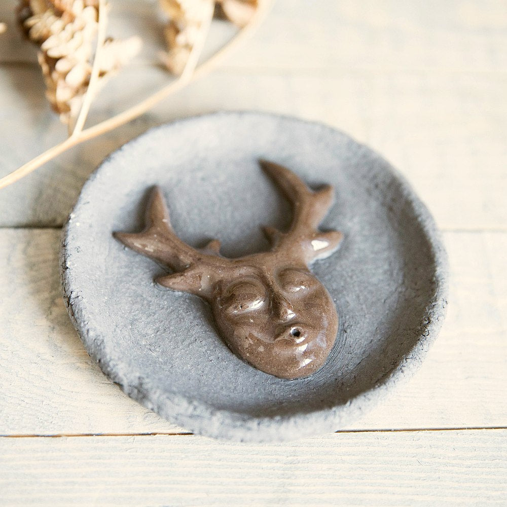 Handmade ceramic incense holder featuring mystic creature. Crafted from black grogged clay.