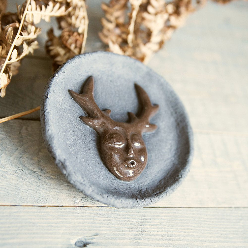 Handmade ceramic incense holder featuring mystic creature. Crafted from black grogged clay.