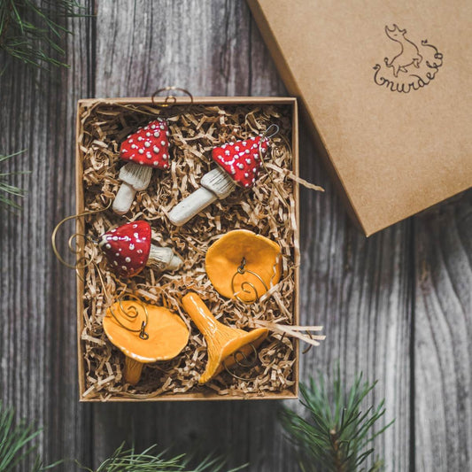 Christmas ornament set of six red amanita and orange chanterelle mushrooms. Packed in a gift box with hooks.