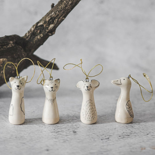 Christmas tree domestic animals decoration set of four. Dog, cat, mouse and duck ceramic ornaments hanging from a gold string.