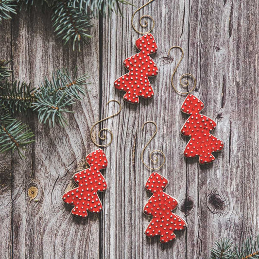 Ceramic red dotted spruce Christmas tree decorations with hooks.