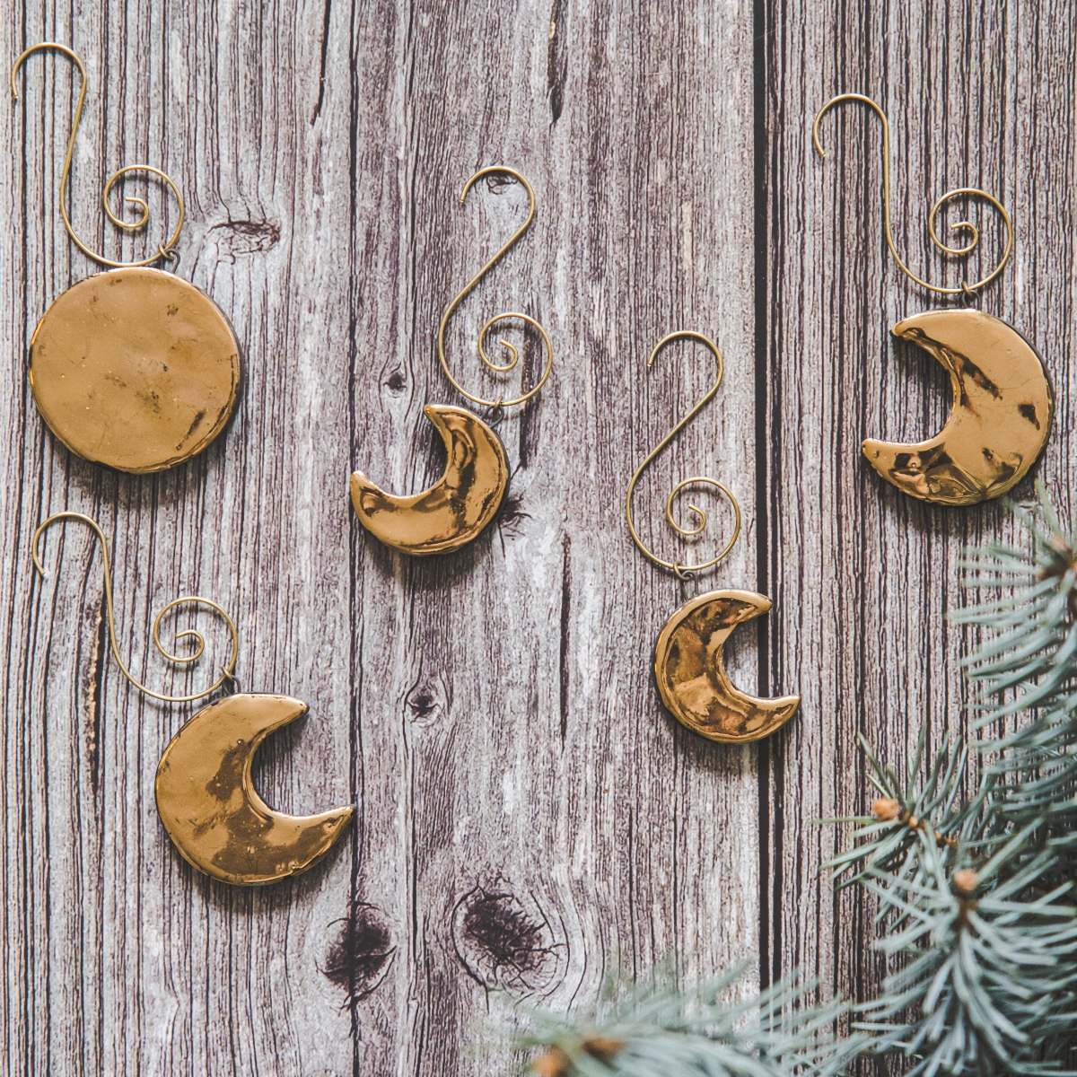 Gold plated ceramic moon phases Christmas ornament set of five: Full moon, young moon, old moon. Lunar Christmas decoration gift with hooks.
