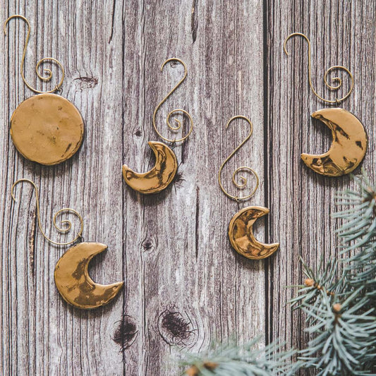 Gold plated ceramic moon phases Christmas ornament set of five: Full moon, young moon, old moon. Lunar Christmas decoration gift with hooks.