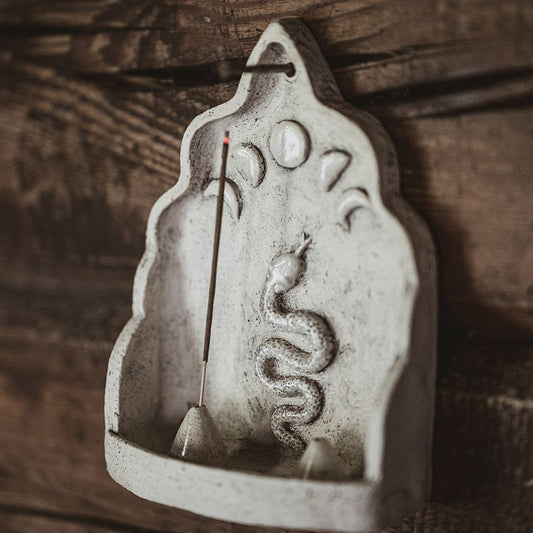 Hanging ceramic incense holder with a snake