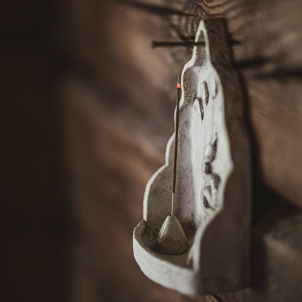 Hanging ceramic incense holder with a snake