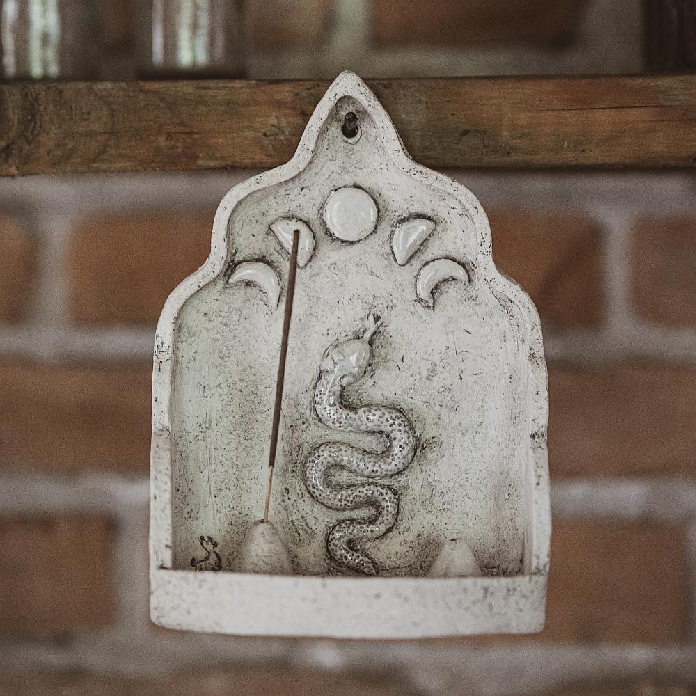 Hanging ceramic incense holder with a snake