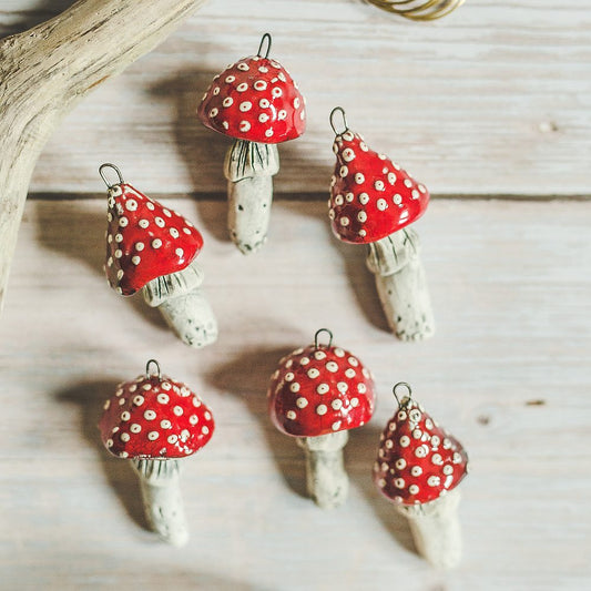 Christmas ornament set of six red amanita mushrooms. Packed in a gift box with hooks.