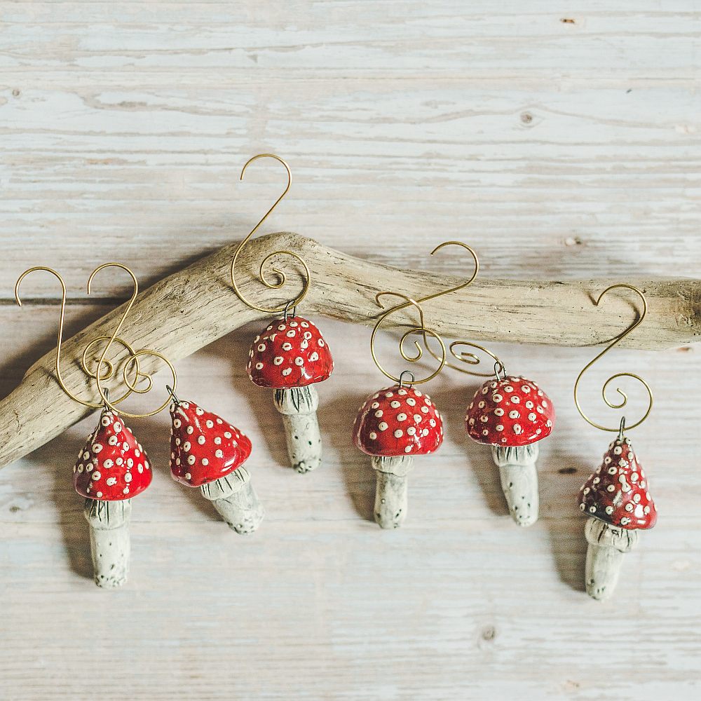 Christmas ornament set of six red amanita mushrooms. Packed in a gift box with hooks.