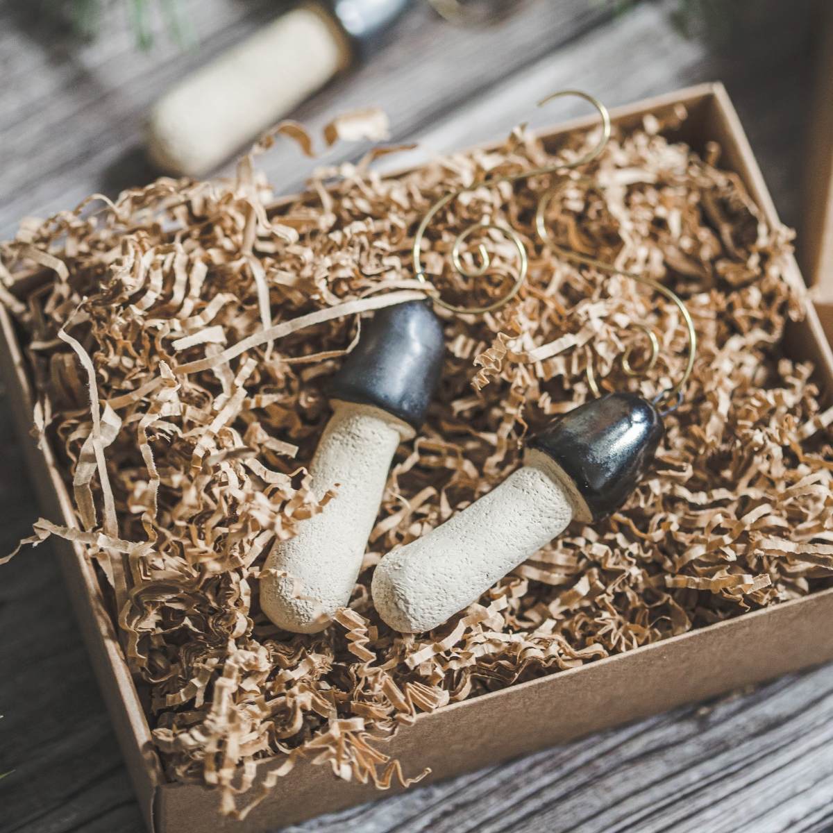 Christmas tree ornament set of four Stinkhorn mushrooms. Packed in a paper gift box.