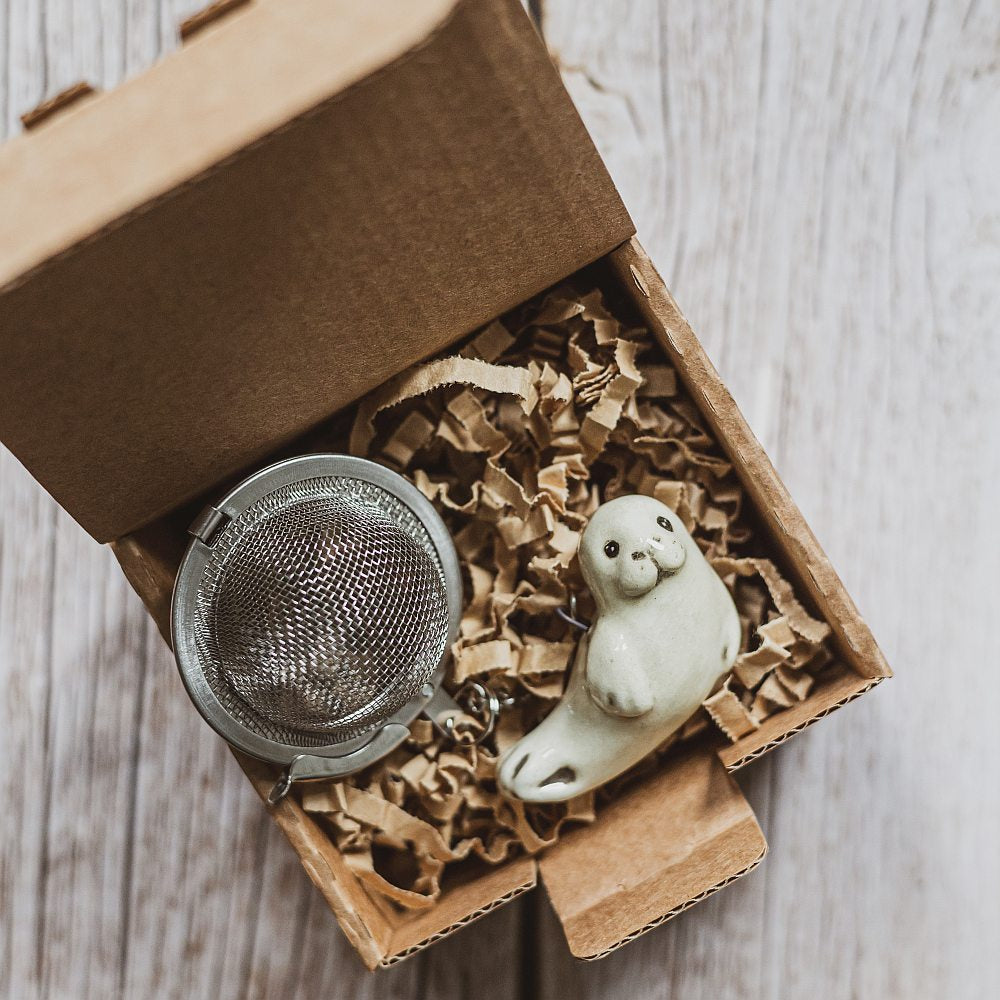 tea infuser with ceramic seal hanging from the chain