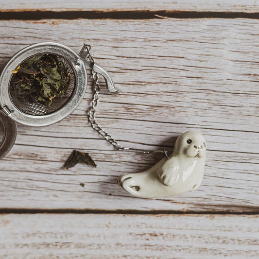 tea infuser with ceramic seal hanging from the chain